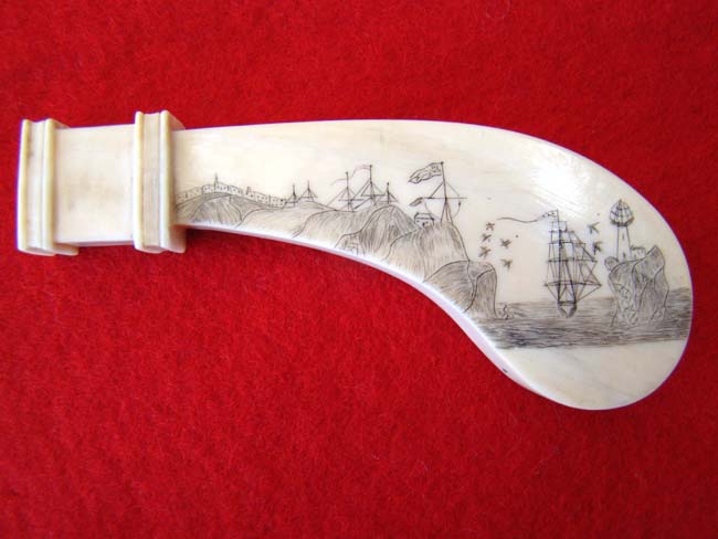 A 19th century sailor-made scrimshawed whale ivory pie crimper handle